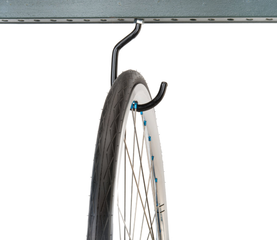 Park Tool 450 instalado a suportar uma roda de bicicleta de estrada