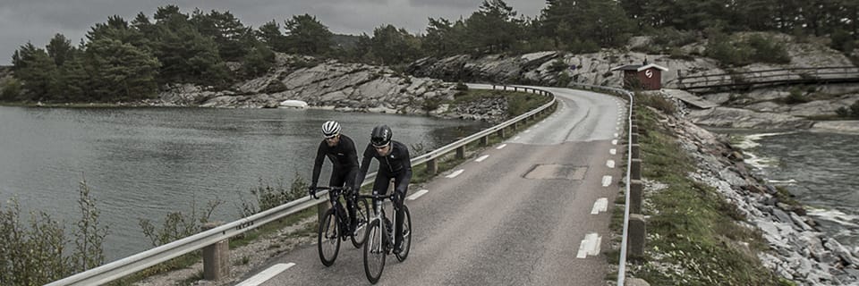 Como posso ajustar os travões da minha bicicleta de estrada?