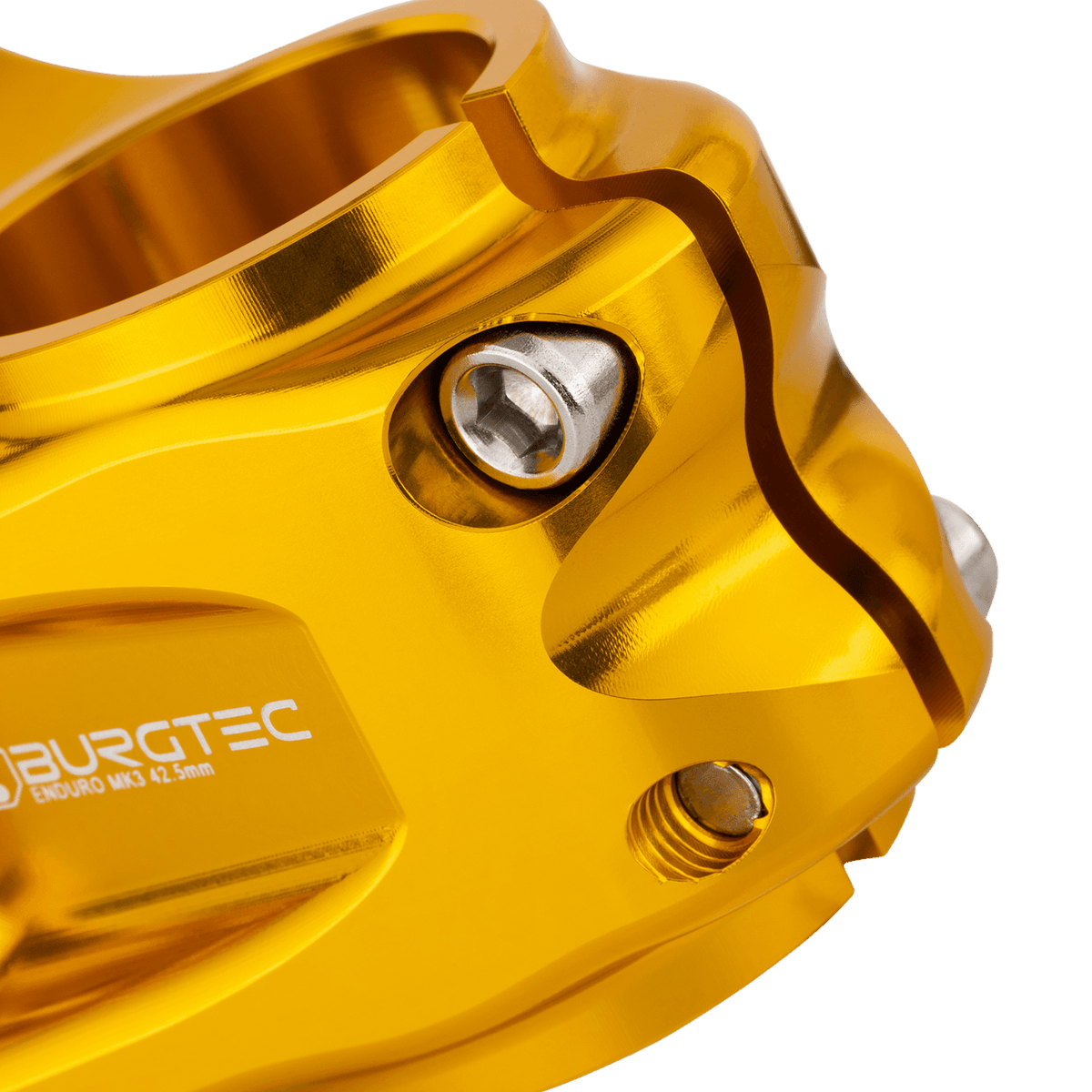 Avanço BURGTEC ENDURO MK3 dourado — detalhe do aperto do tubo de direção