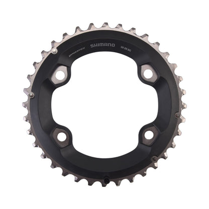 Prato exterior SHIMANO SLX M7000 de 11 velocidades, pedaleiro duplo, 4 furos, 96 mm — vista do prato sobre fundo branco
