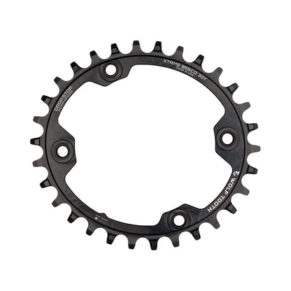 Prato único oval WOLF TOOTH ELLIPTICAL 96 BCD 11 velocidades Shimano XTR M9000/9020, 4 furos, 96 mm, preto — vista do prato sobre fundo branco