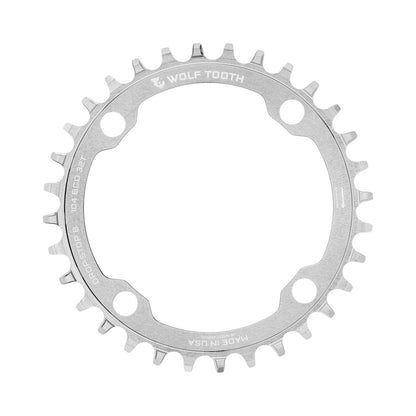 Prato único WOLF TOOTH DROP-STOP B de 104 mm, prata natural — vista do prato sobre fundo branco