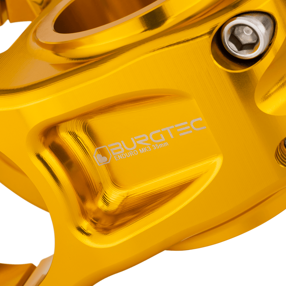 Avanço BURGTEC ENDURO MK3 dourado — detalhe do corpo maquinado