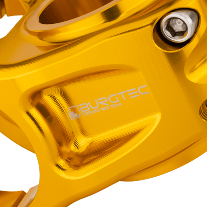 Avanço BURGTEC ENDURO MK3 dourado — detalhe do corpo maquinado